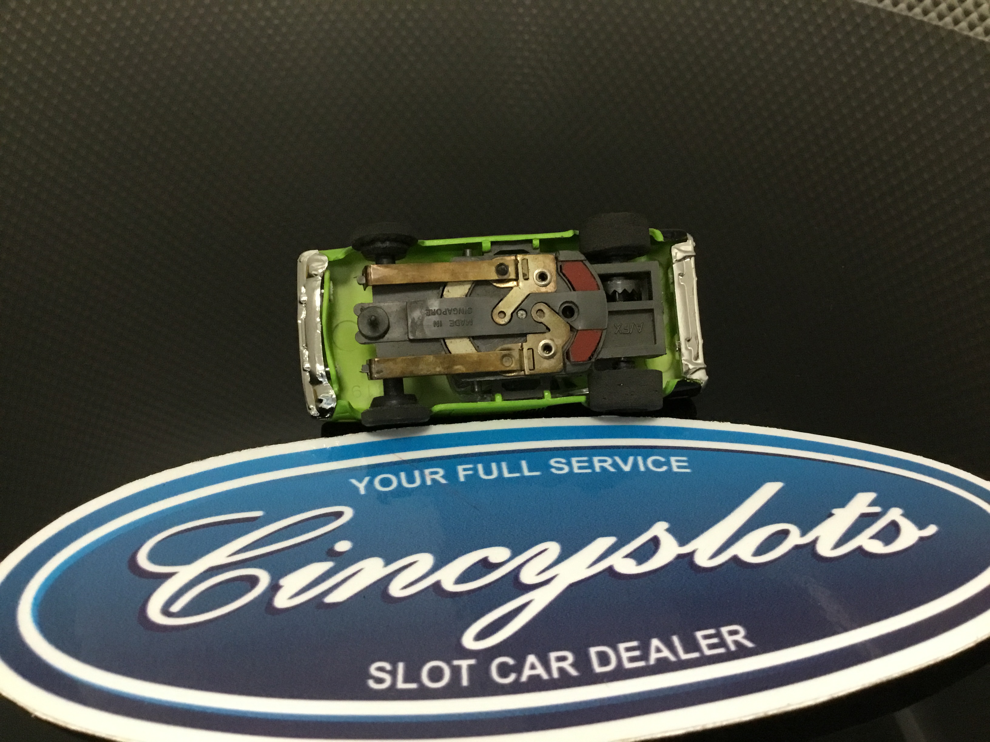 AFX ORIGINAL CHASSIS WITH A NEW AUTOWORLD CUDA BODY HO SLOT CAR. USED