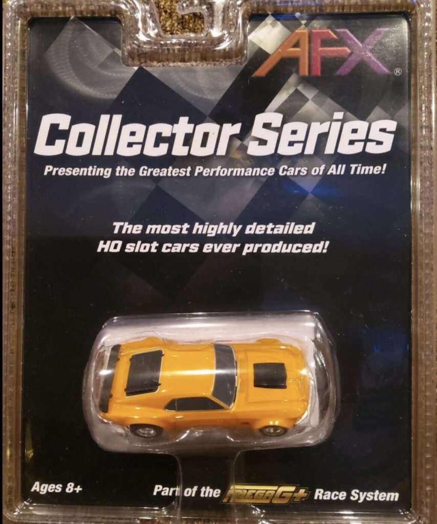 AFX 21017 Collector Series '70's Mustang Yellow.